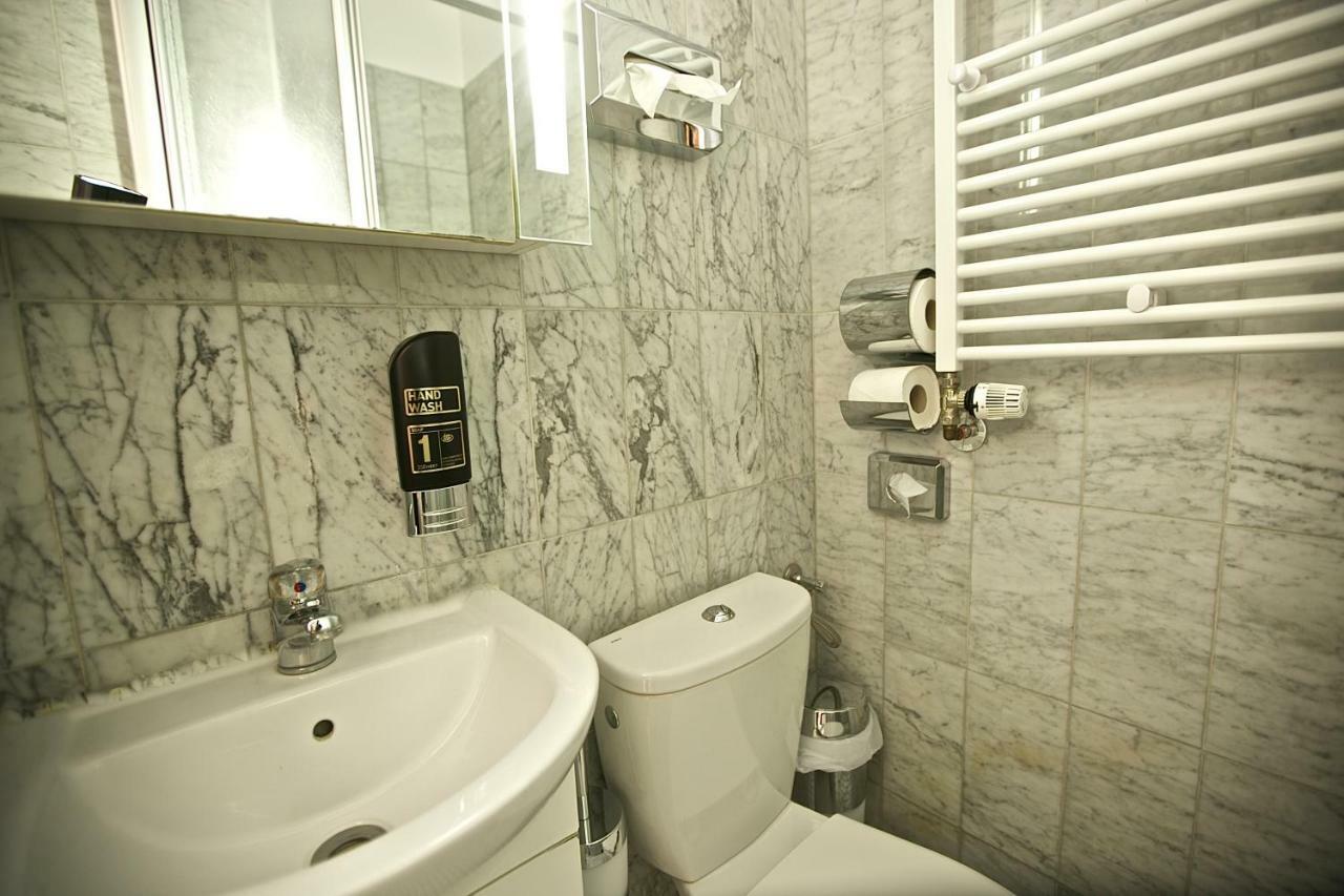 Aparthotel Christie Berlim Quarto foto