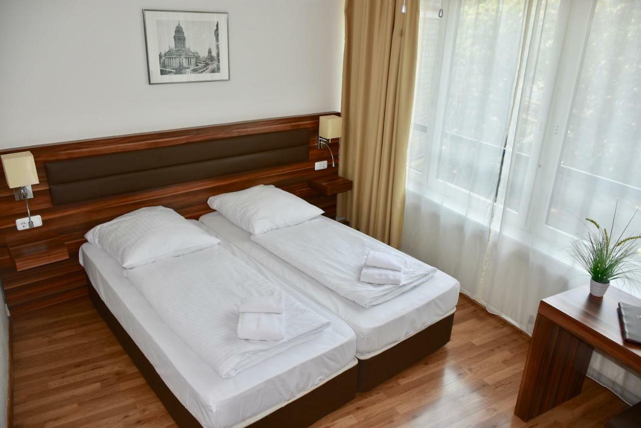Aparthotel Christie Berlim Quarto foto